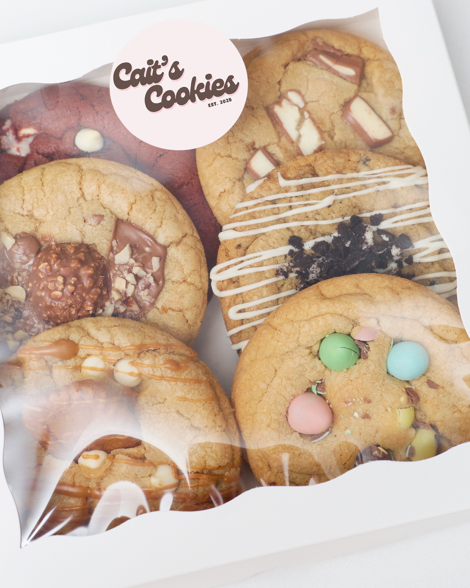 Box of assorted Cait's Cookies ready for pickup
